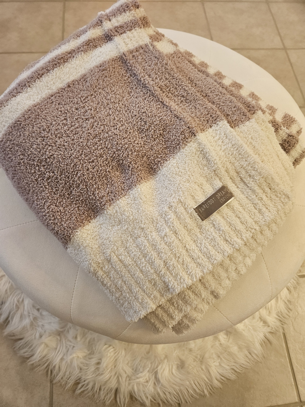 Barefoot Dreams Cozy Two-Tone Cream and Taupe Bath Towel